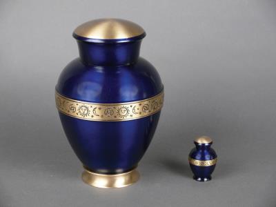 brass cremation urn with sun moon stars in royal blue